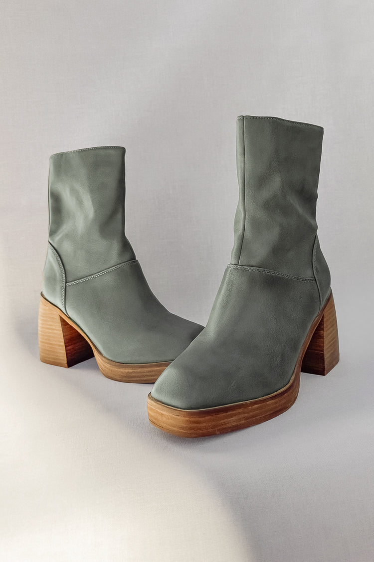 heeled booties in green