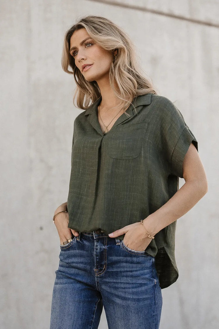 Rolled cuff sleeves top in green 