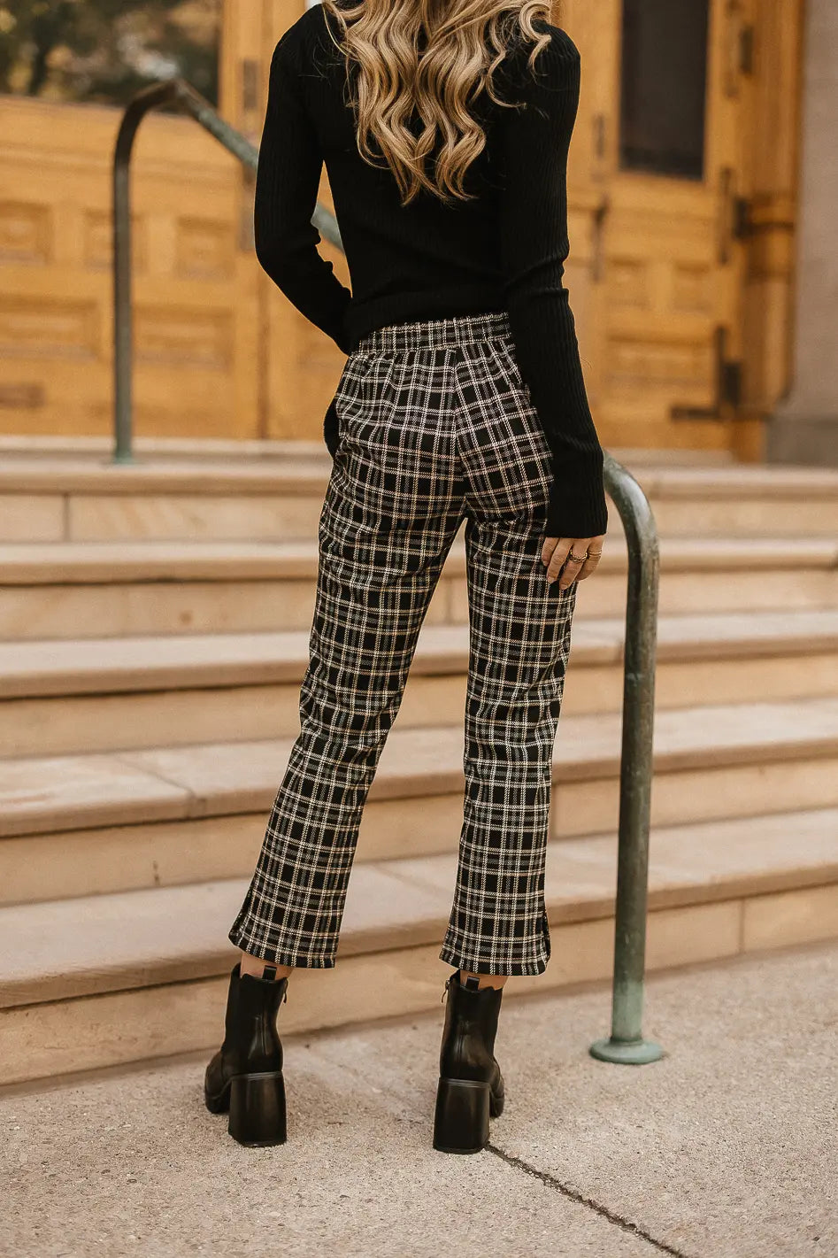 Woman in Black and White Checkered Long Sleeve Shirt and Black Pants · Free  Stock Photo