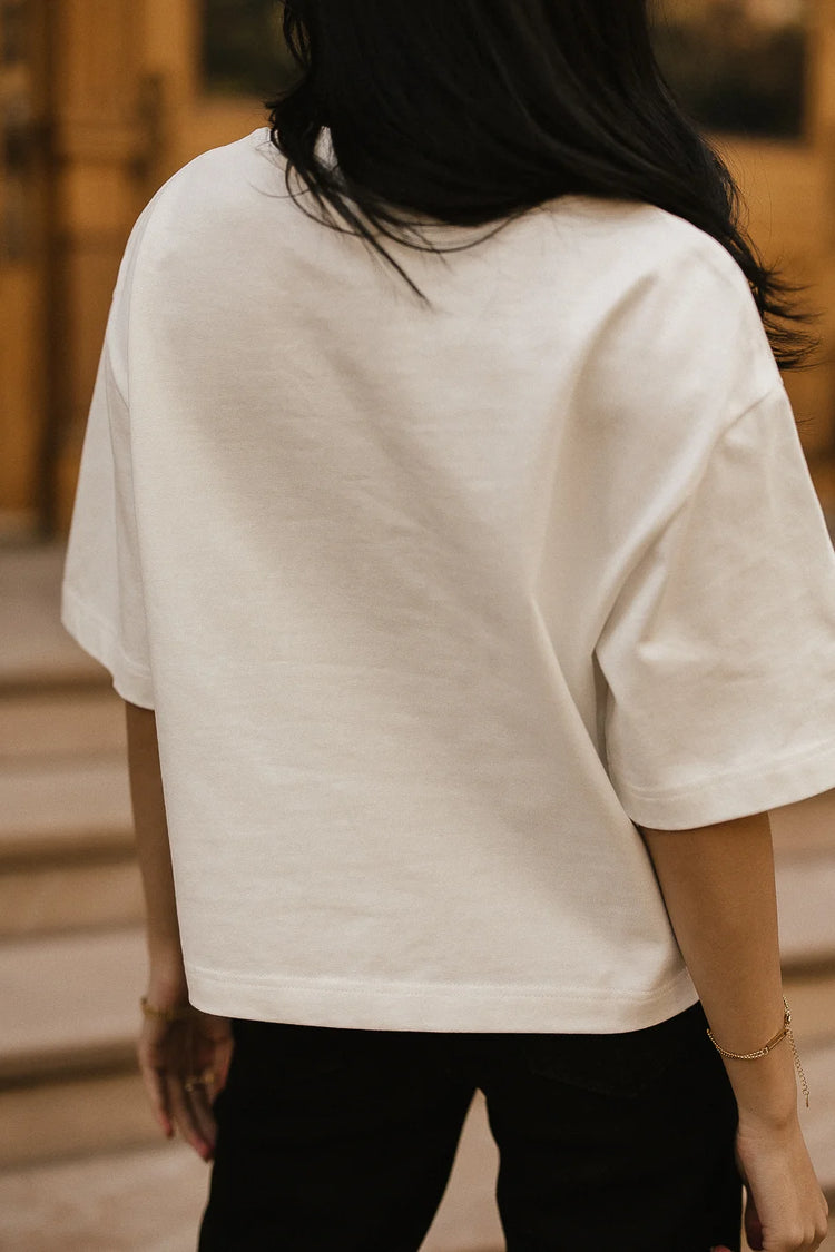 knit top in white with a  New York City design 
