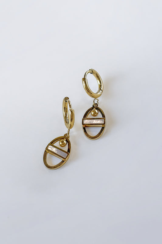 oval design earrings in gold