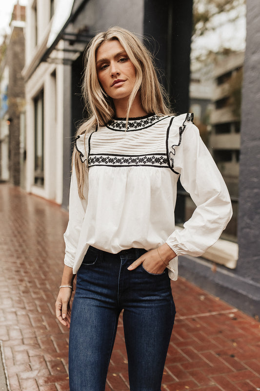 Round neck embroidered top