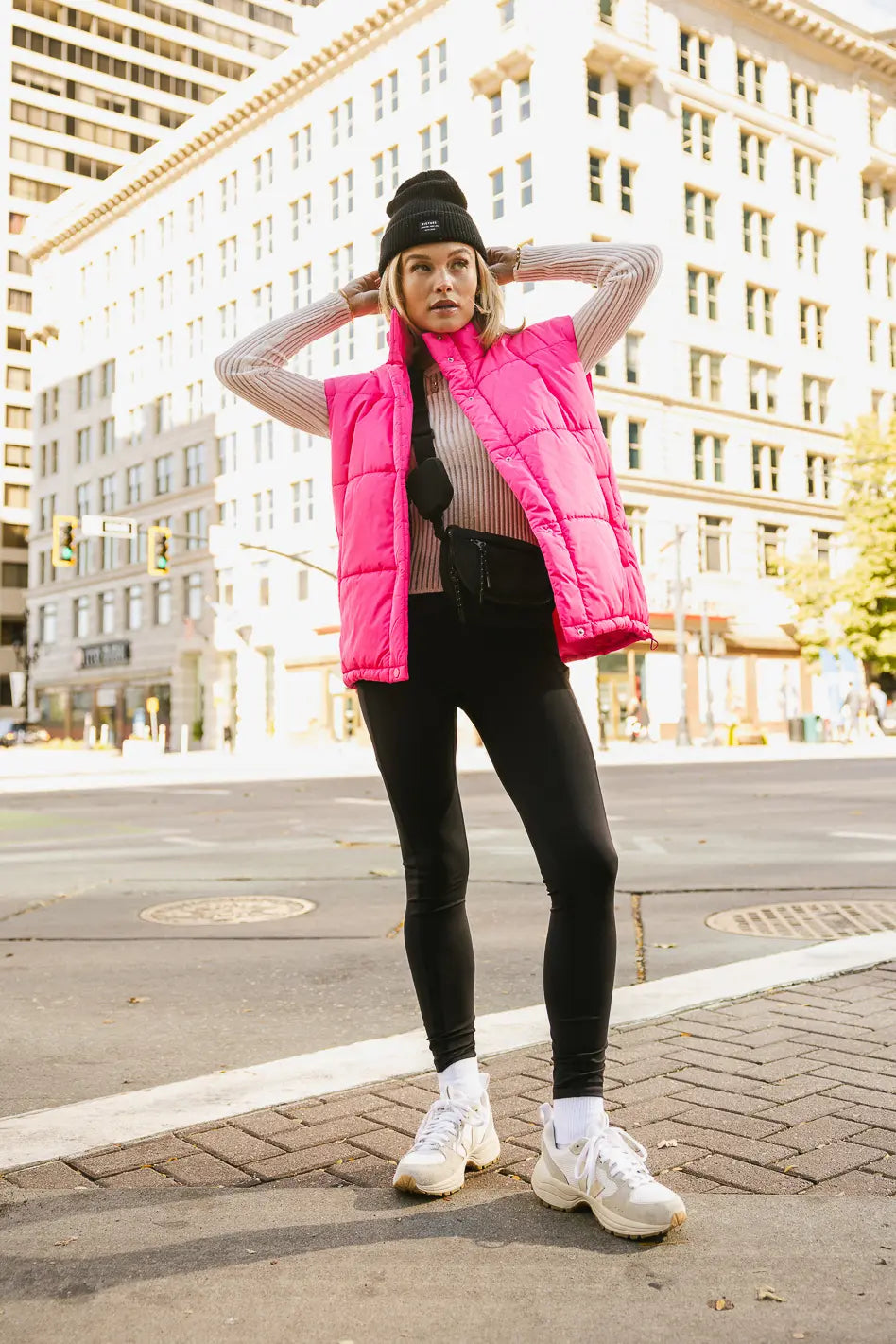 Zero sleeves puffer vest in pink 