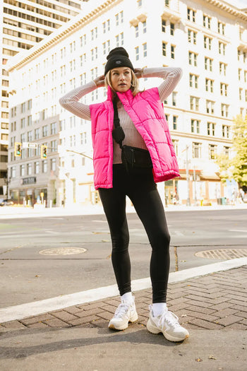 Zero sleeves puffer vest in pink 
