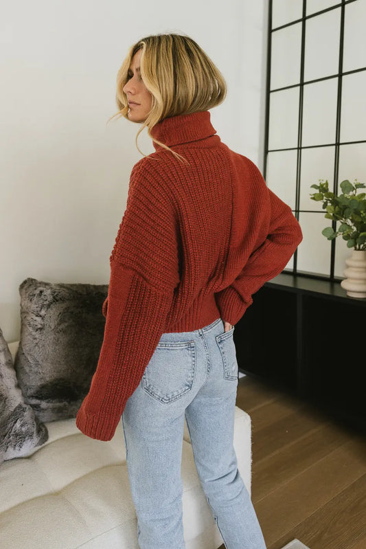 Almost cropped turtle neck sweater in brick 