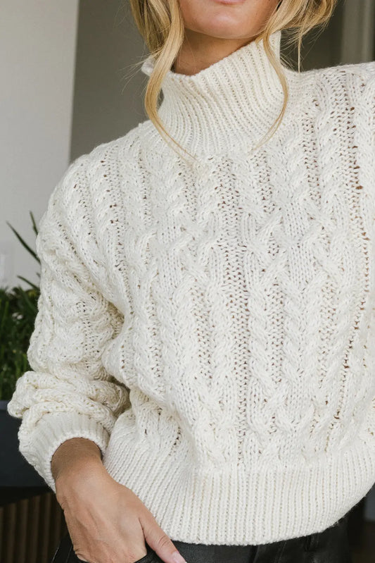Cable knit sweater in cream 