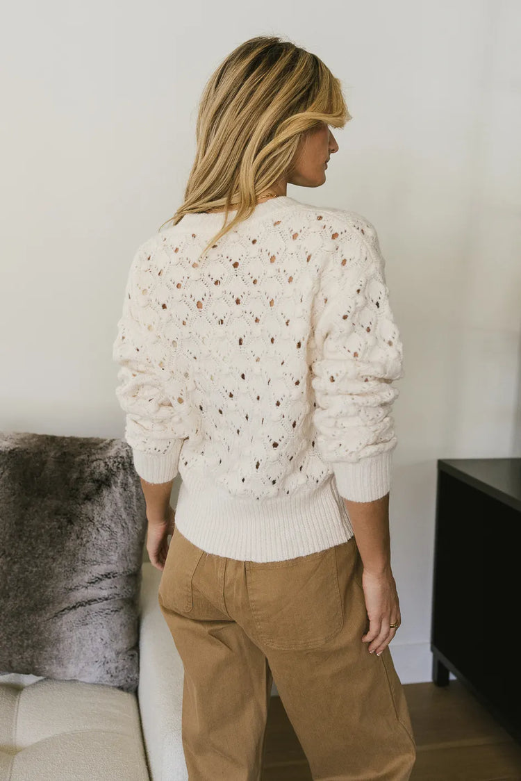 slightly see through knit sweater in cream