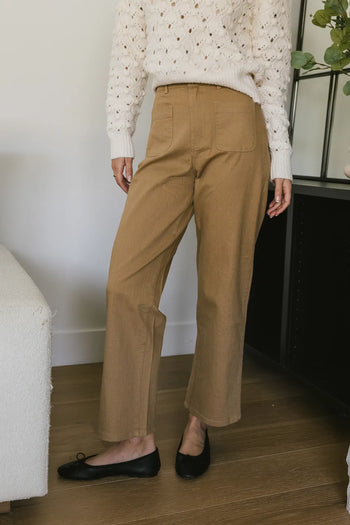 front pockets on tan straight leg denim