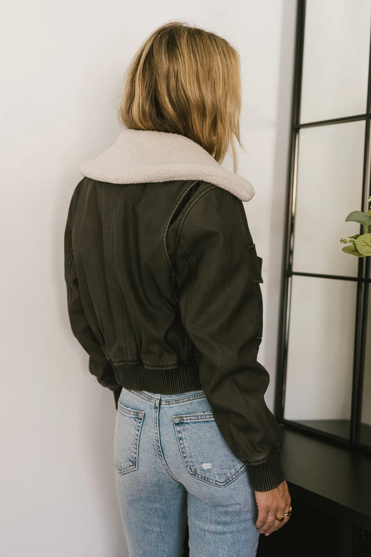 Elastic hem vegan leather jacket in black 