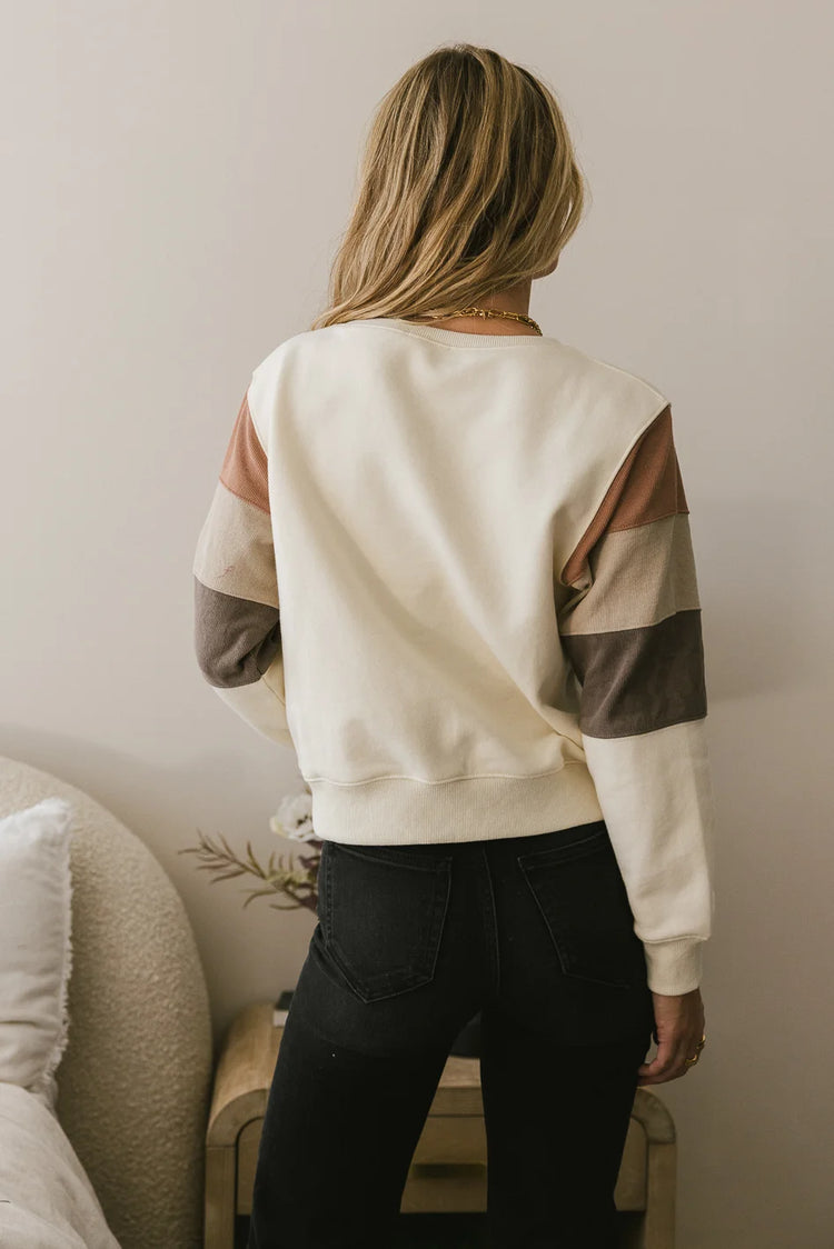 Non stretchy color block sweater in cream 