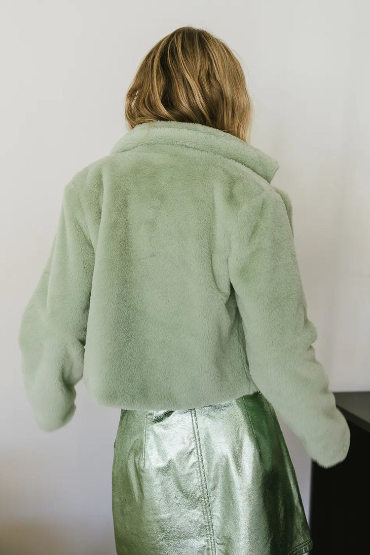 Non stretchy faux fur jacket in sage 