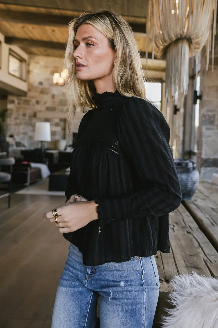 Ruffle cuff sleeves top in black 