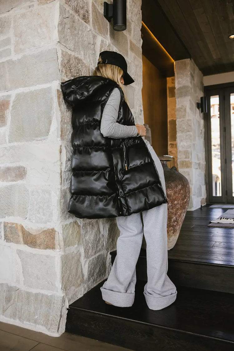 Puffer vest with a hoodie in black 