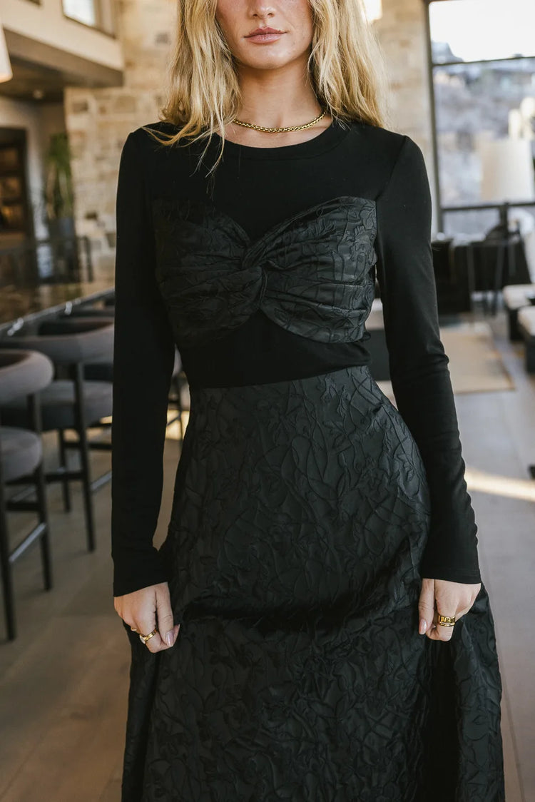 round neckline on black midi dress