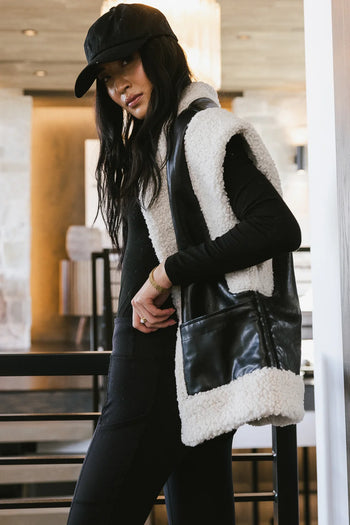 Sherpa vest in black and cream 