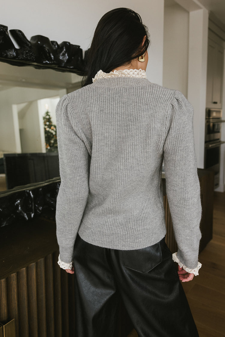ruffle detail knit sweater in grey