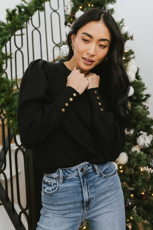 black knit sweater with buttons