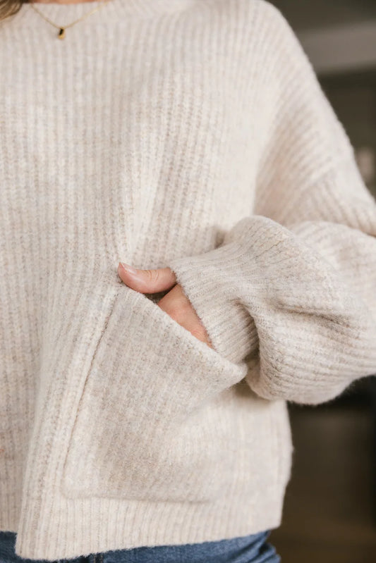 front pocket on taupe sweater