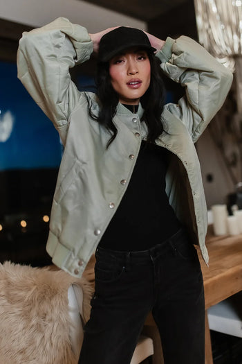snap closure on sage bomber jacket