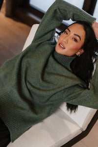 Ribbed high neck sweater in green 