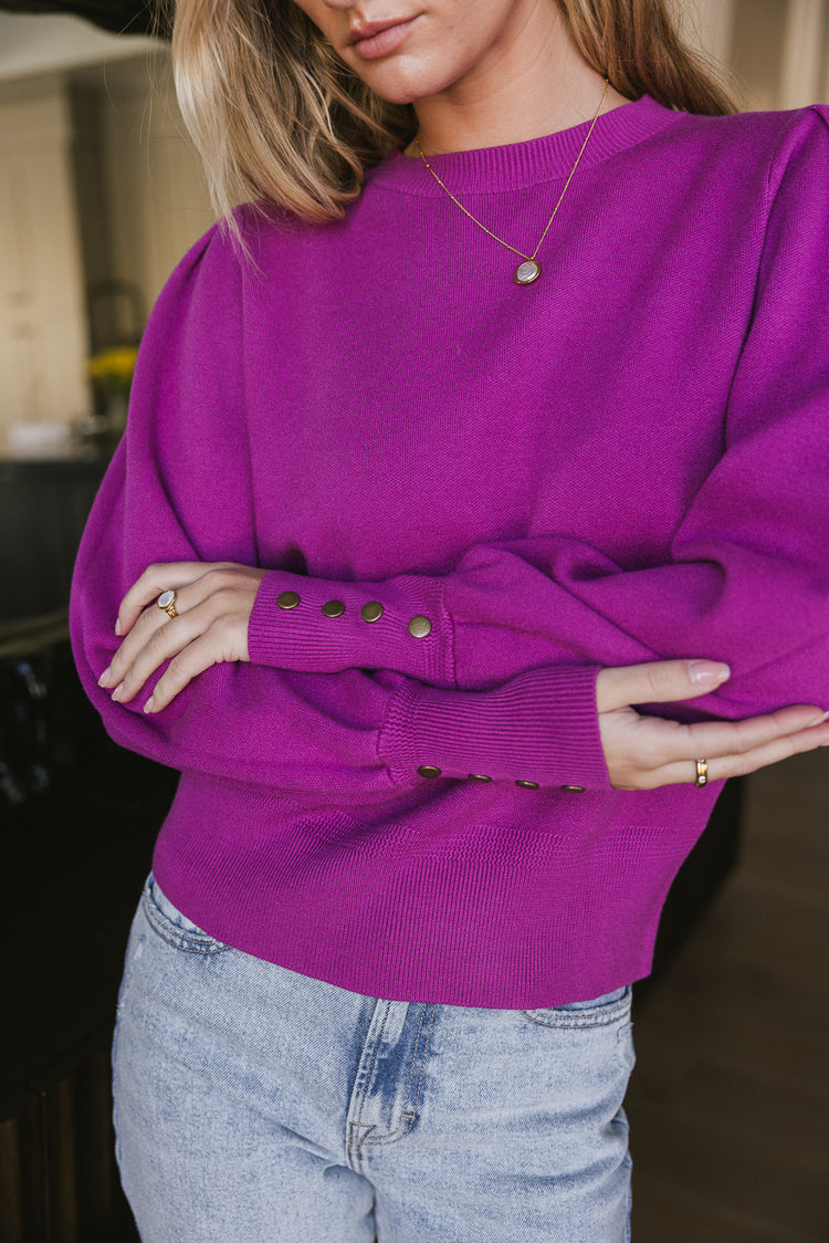 purple sweater with buttons