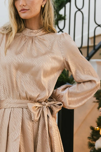 bow tie waist on champagne dress