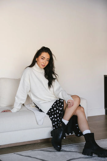 White sweater with side slits