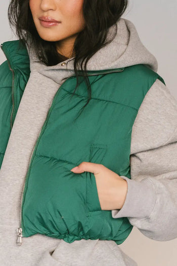 green puffer vest