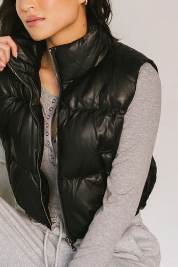 black puffer vest
