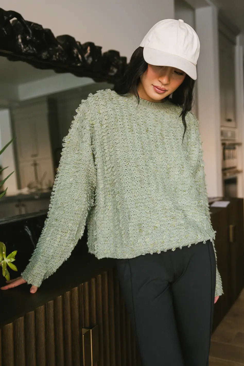 Green top fuzzy sweater