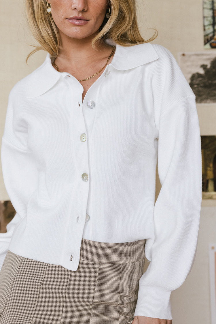 white button front sweater