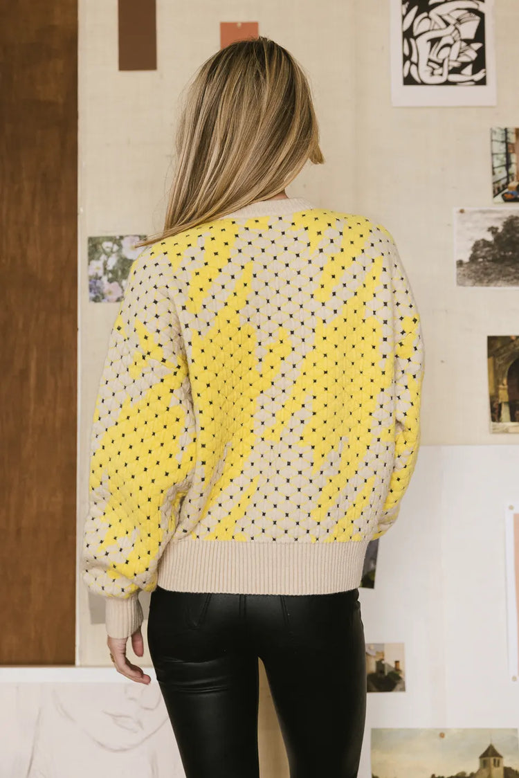 yellow long sleeve sweater