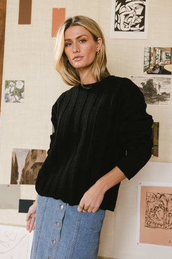 black ribbed sweater
