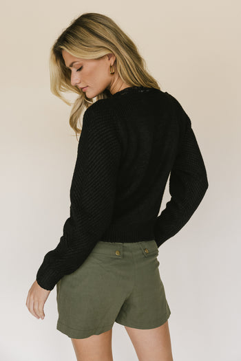 black textured sweater 