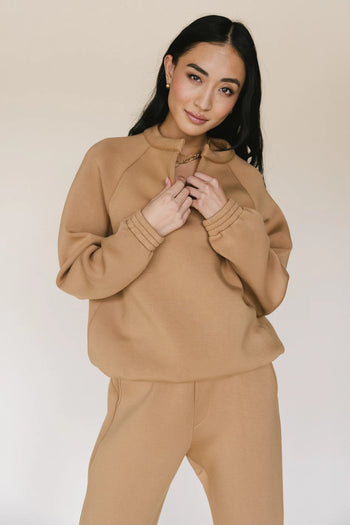 elastic cuffs on camel sweatshirt