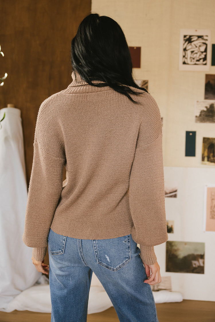 brown sweater with long sleeves