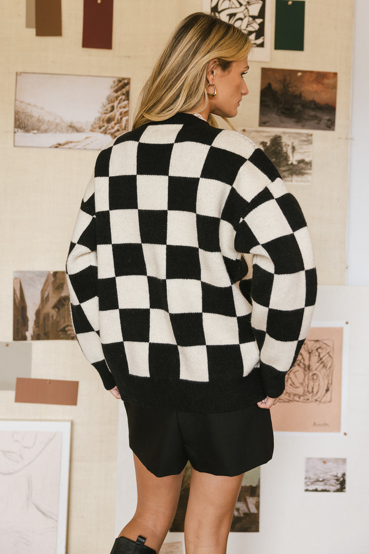 knit checker sweater in black and white