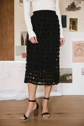 Elastic waist open cage skirt in black 