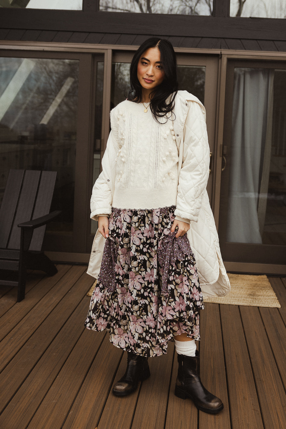 ivory knit sweater with pom pom details