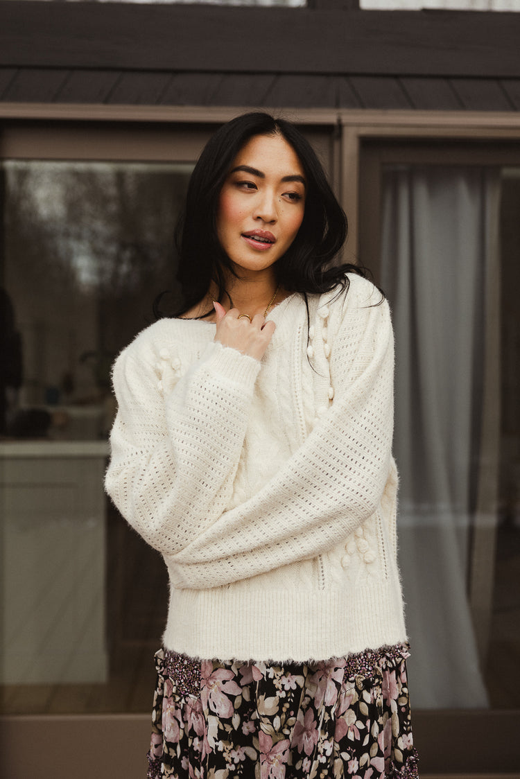 white knit sweater
