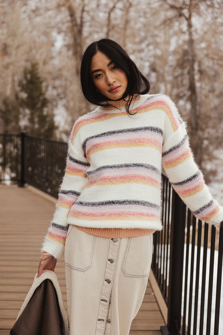 cream sweater with stripes