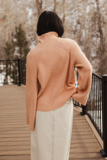 orange turtle neck long sleeve sweater