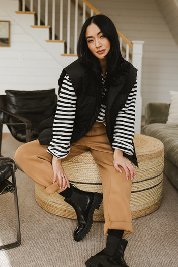 black sleeveless puffer vest