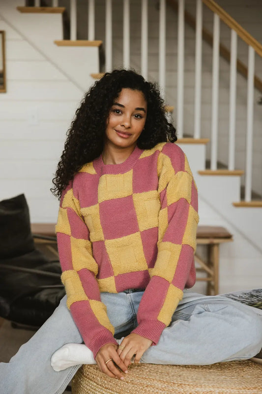 pink and yellow checkered sweater
