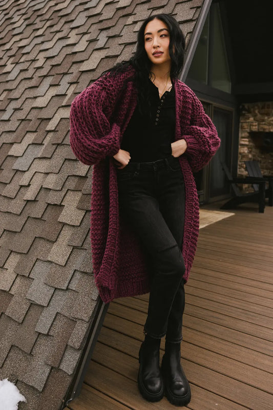 Long cardigan paired with black denim  
