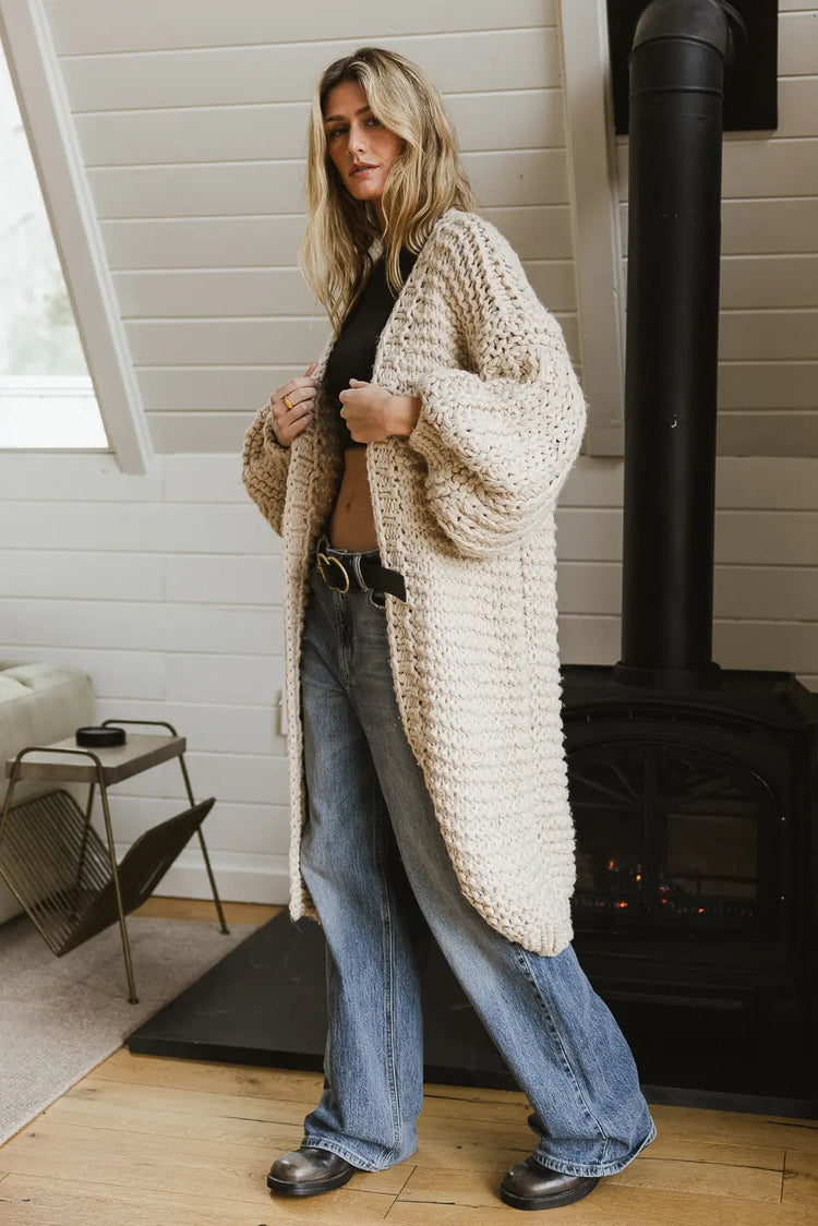 Long cardigan paired with denim 