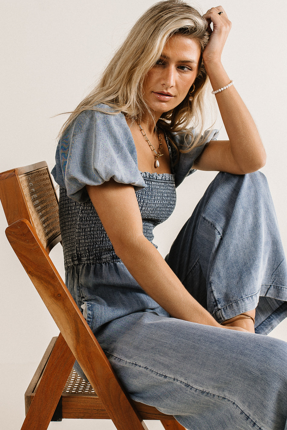 smocked jumpsuit with puff sleeves