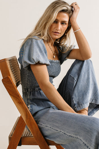 smocked jumpsuit with puff sleeves