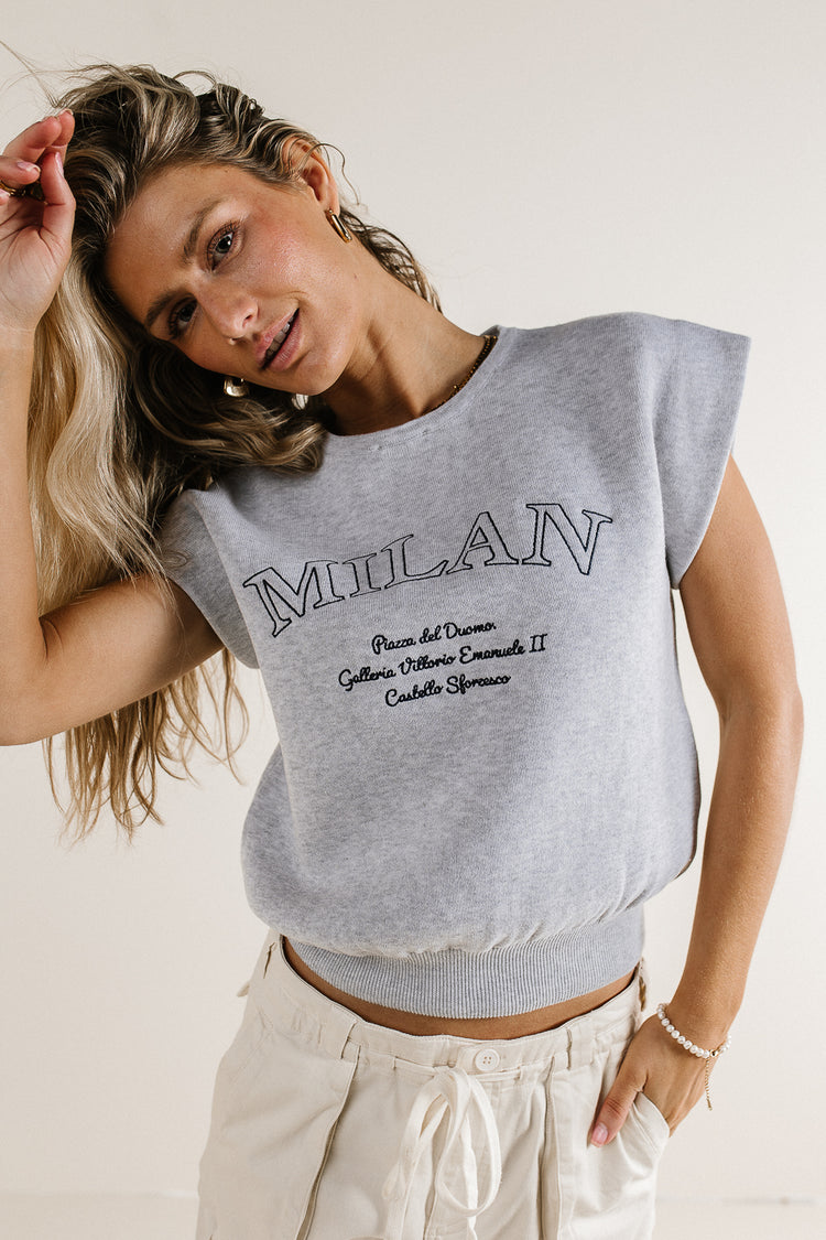 knit sweater in grey with milan text