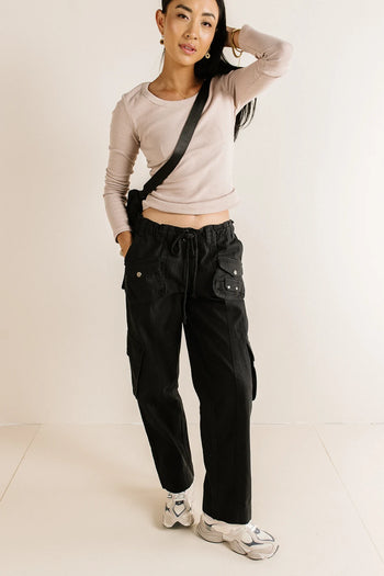 Top in mauve paired with a cargo pants 